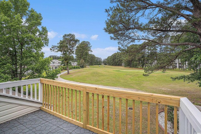deck featuring a yard