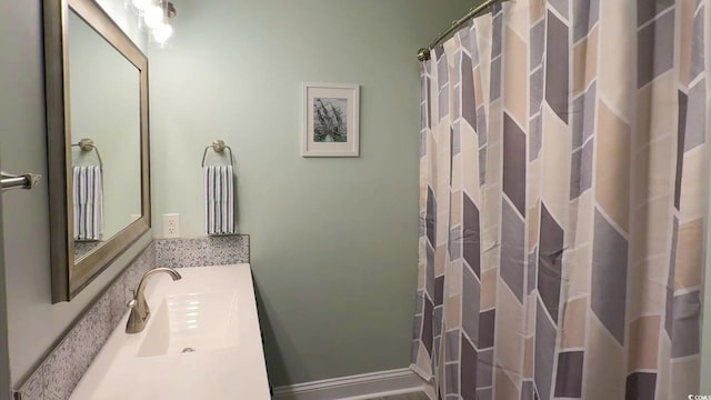 full bathroom with vanity and curtained shower