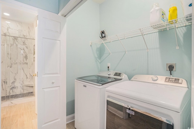 511 Colonial Trace Dr Unit 7-C, Longs, SC 29568 - laundry room with washing machine and dryer, light wood-style floors, and recessed lighting