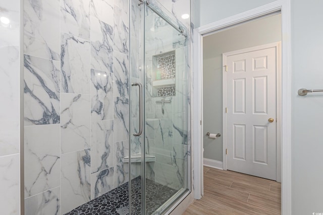 511 Colonial Trace Dr Unit 7-C, Longs, SC 29568 - bathroom featuring a marble finish shower and wood finished floors
