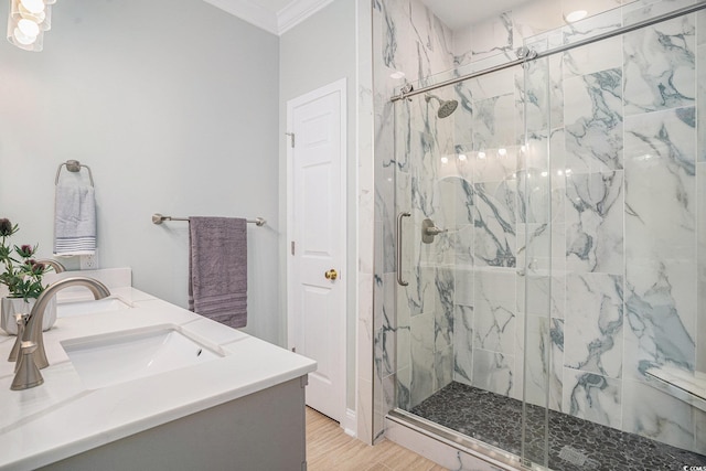 511 Colonial Trace Dr Unit 7-C, Longs, SC 29568 - bathroom featuring ornamental molding, a marble finish shower, double vanity, and wood finished floors