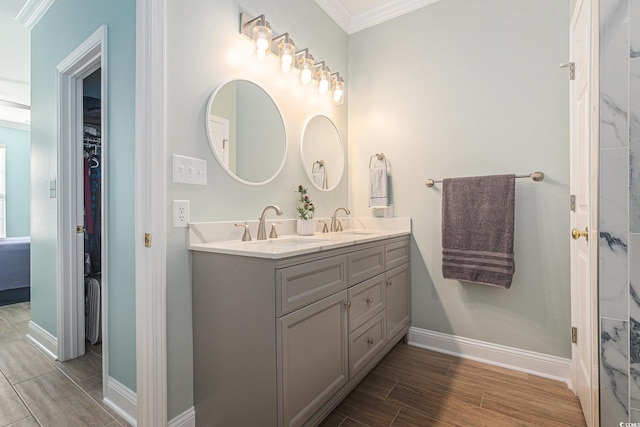 511 Colonial Trace Dr Unit 7-C, Longs, SC 29568 - bathroom featuring ornamental molding, double vanity, wood tiled floors, and a spacious closet