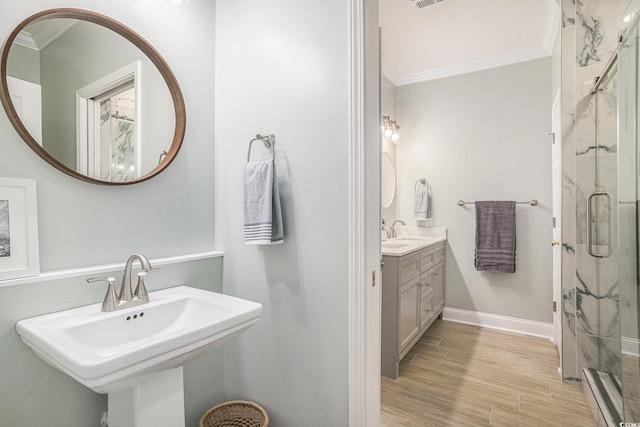 511 Colonial Trace Dr Unit 7-C, Longs, SC 29568 - full bathroom featuring crown molding, a stall shower, and wood finished floors
