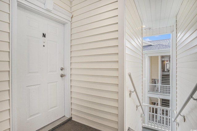 488 River Oaks Dr Unit 61N, Myrtle Beach, SC 29579 - view of exterior entry featuring a shingled roof