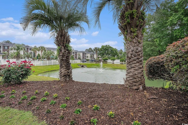 488 River Oaks Dr Unit 61N, Myrtle Beach, SC 29579 - view of yard with a water view, fence, and a residential view