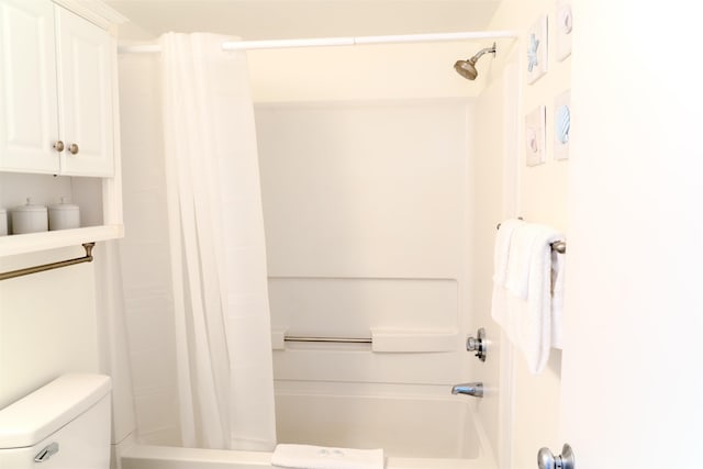 full bath with toilet and shower / bath combo