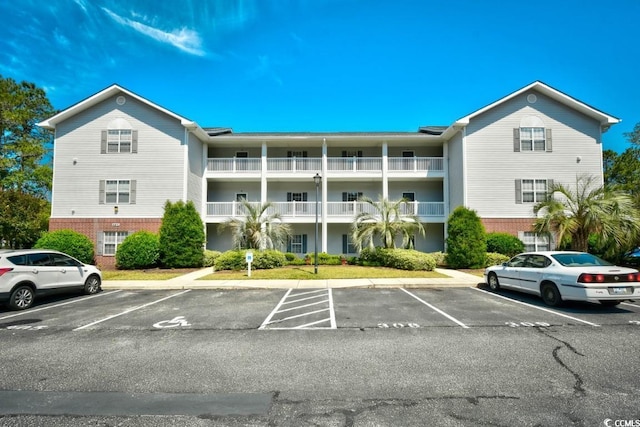 4811 Innisbrook Ct Unit 306, Myrtle Beach, SC 29579 - view of property featuring uncovered parking