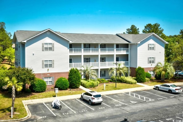 4811 Innisbrook Ct Unit 306, Myrtle Beach, SC 29579 - view of property featuring uncovered parking