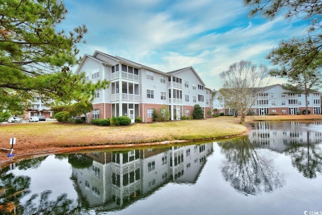 4811 Innisbrook Ct Unit 306, Myrtle Beach, SC 29579 - rear view of house with brick siding and a water view