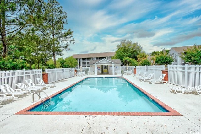4811 Innisbrook Ct Unit 306, Myrtle Beach, SC 29579 - community pool featuring a patio area and fence