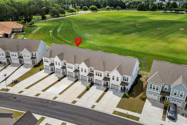 5127 Double Eagle Way Unit 11, North Myrtle Beach, SC 29582 - drone / aerial view of a golf club and a tree filled landscape