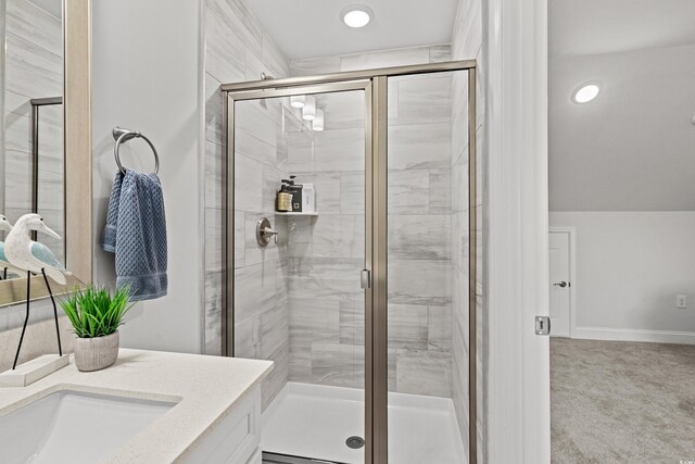 5127 Double Eagle Way Unit 11, North Myrtle Beach, SC 29582 - bathroom featuring a stall shower, vanity, and baseboards