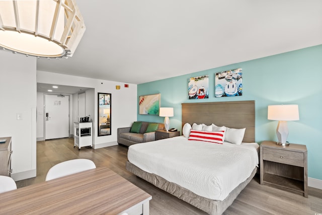 2401 S Ocean Blvd Unit 351, Myrtle Beach, SC 29577 - bedroom featuring wood finished floors and baseboards