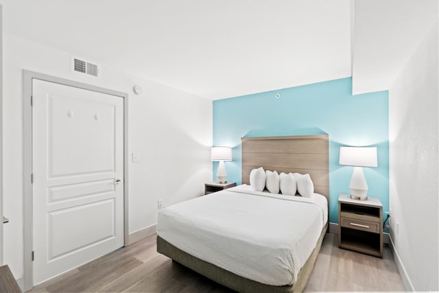 2301 S Ocean Blvd Unit 621, Myrtle Beach, SC 29577 - bedroom featuring wood finished floors and baseboards