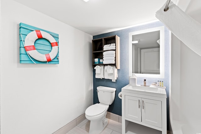 2301 S Ocean Blvd Unit 621, Myrtle Beach, SC 29577 - bathroom with toilet, vanity, and baseboards