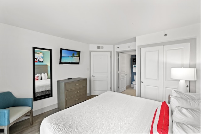 2301 S Ocean Blvd Unit 621, Myrtle Beach, SC 29577 - bedroom with baseboards, light wood-type flooring, and a closet
