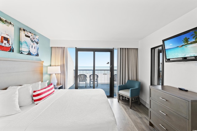 2301 S Ocean Blvd Unit 621, Myrtle Beach, SC 29577 - bedroom with wood finished floors and access to outside