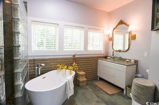 bathroom featuring a freestanding tub