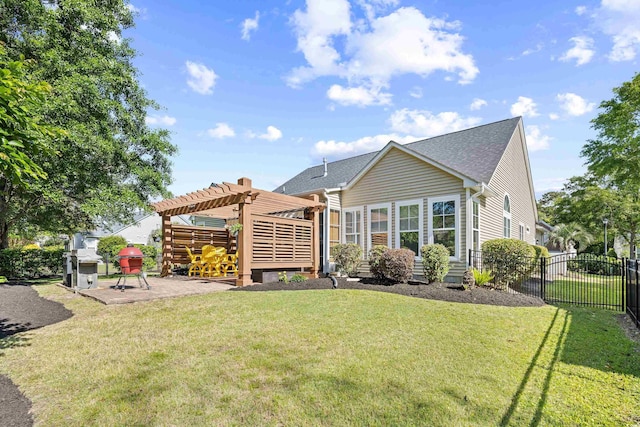 rear view of house with a pergola, a patio, and roof with shingles