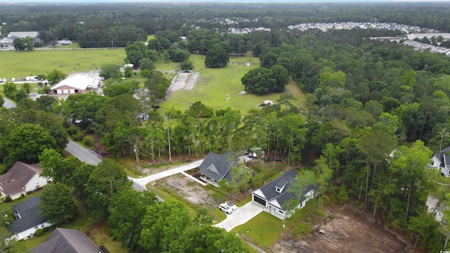 4120 Whatuthink Rd, Myrtle Beach, SC 29588 - aerial overview of property's location with nearby suburban area and a forest