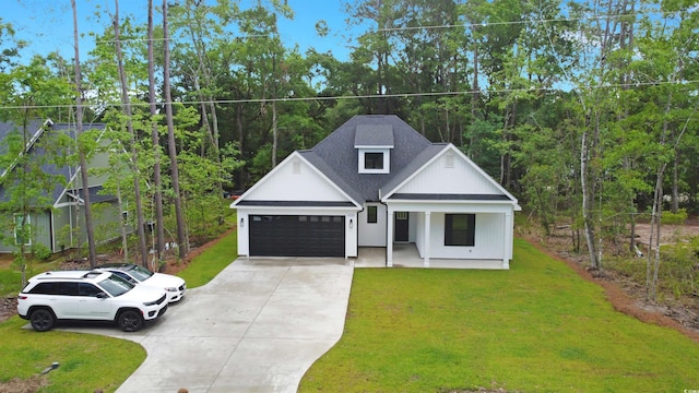 4120 Whatuthink Rd, Myrtle Beach, SC 29588 - modern inspired farmhouse featuring driveway, an attached garage, a front yard, covered porch, and roof with shingles