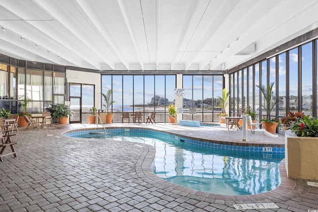 9400 Shore Dr Unit 509, Myrtle Beach, SC 29572 - indoor community pool featuring a patio area and fence
