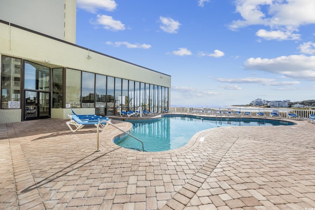 9400 Shore Dr Unit 509, Myrtle Beach, SC 29572 - community pool with a patio and fence