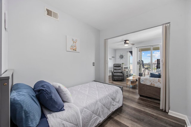 9400 Shore Dr Unit 509, Myrtle Beach, SC 29572 - bedroom featuring access to exterior, wood finished floors, and a ceiling fan