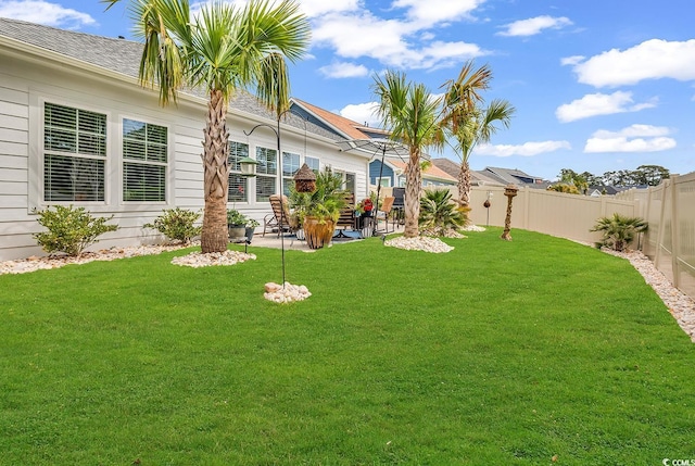 1340 Jolly Roger Dr, North Myrtle Beach, SC 29582 - view of yard featuring a patio