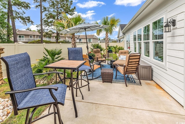 1340 Jolly Roger Dr, North Myrtle Beach, SC 29582 - view of patio / terrace featuring a fenced backyard and outdoor lounge area