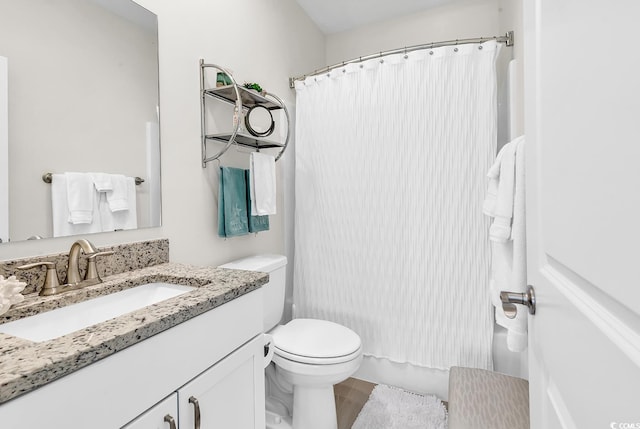 1340 Jolly Roger Dr, North Myrtle Beach, SC 29582 - bathroom featuring vanity, toilet, a shower with curtain, and wood finished floors