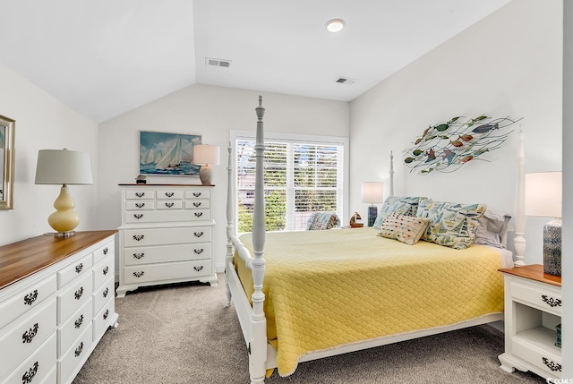 1340 Jolly Roger Dr, North Myrtle Beach, SC 29582 - bedroom with light carpet and lofted ceiling