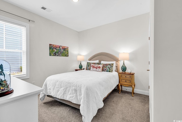 1340 Jolly Roger Dr, North Myrtle Beach, SC 29582 - bedroom featuring light carpet and baseboards