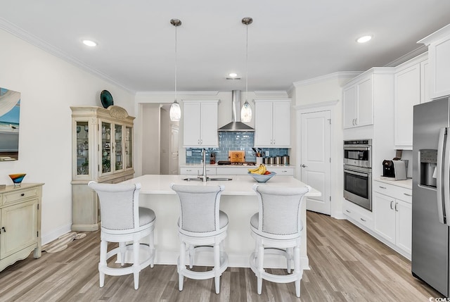 1340 Jolly Roger Dr, North Myrtle Beach, SC 29582 - kitchen featuring appliances with stainless steel finishes, a sink, wall chimney range hood, light countertops, and backsplash