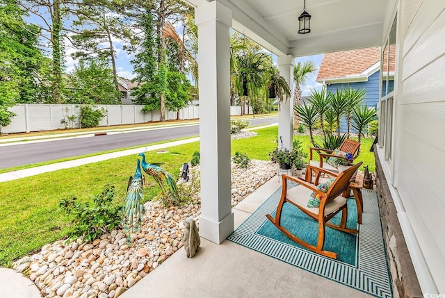 1340 Jolly Roger Dr, North Myrtle Beach, SC 29582 - view of patio / terrace featuring covered porch
