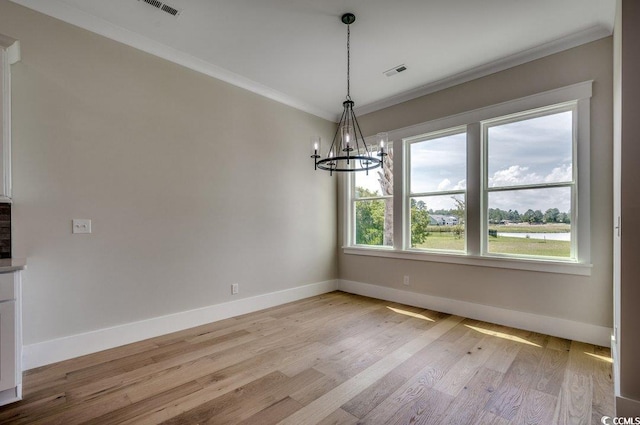 1142 Fiddlehead Way, Myrtle Beach, SC 29579 - unfurnished dining area with a chandelier, baseboards, ornamental molding, and light wood finished floors