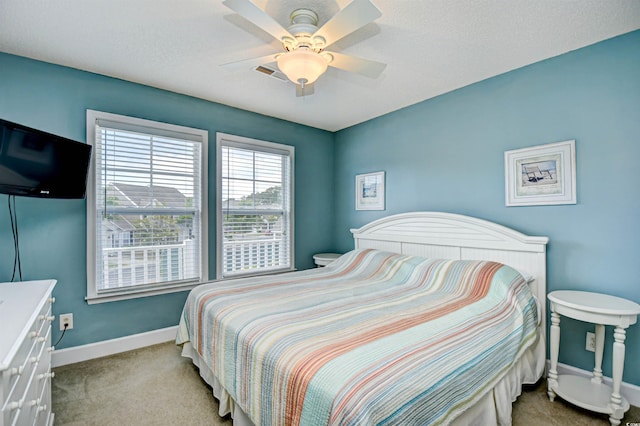 6172 Catalina Dr Unit 515, North Myrtle Beach, SC 29582 - carpeted bedroom featuring baseboards and ceiling fan