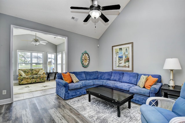 6172 Catalina Dr Unit 515, North Myrtle Beach, SC 29582 - living room featuring vaulted ceiling, ceiling fan, and wood finished floors