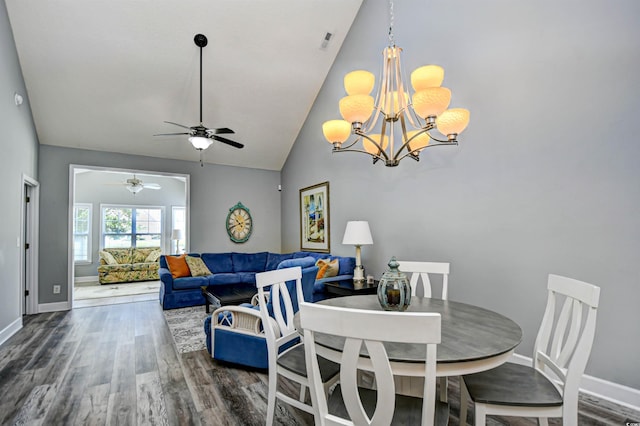 6172 Catalina Dr Unit 515, North Myrtle Beach, SC 29582 - dining space with wood finished floors, a chandelier, a ceiling fan, and high vaulted ceiling