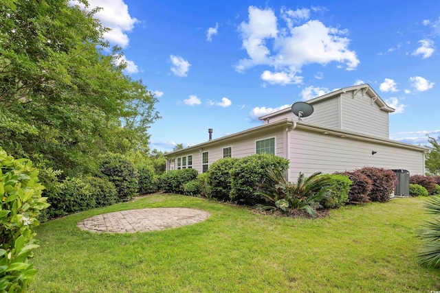 1444 Thames Ct, Myrtle Beach, SC 29577 - view of grassy yard featuring central air condition unit and a patio