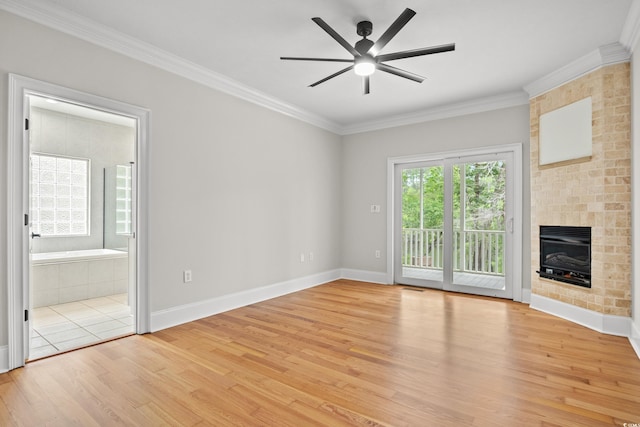 1533 Murrells Landing Rd, Conway, SC 29526 - unfurnished living room with ceiling fan, light wood-style flooring, crown molding, a fireplace, and baseboards