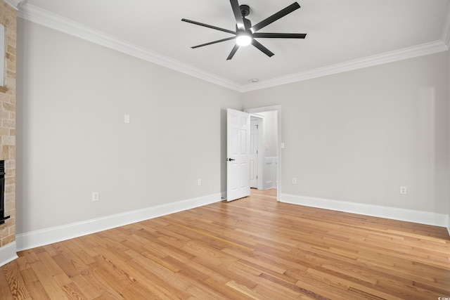 1533 Murrells Landing Rd, Conway, SC 29526 - empty room with ornamental molding, a ceiling fan, light wood-style floors, a brick fireplace, and baseboards