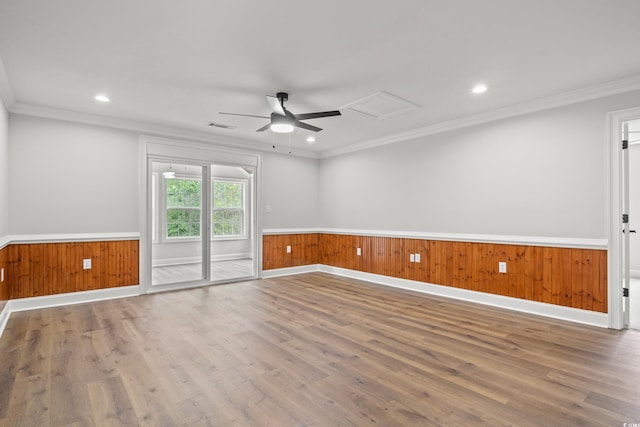 1533 Murrells Landing Rd, Conway, SC 29526 - unfurnished room with wood finished floors, a wainscoted wall, attic access, ceiling fan, and crown molding