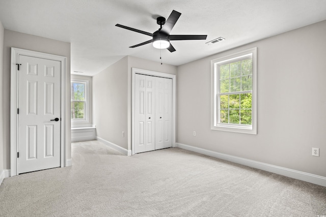 1533 Murrells Landing Rd, Conway, SC 29526 - unfurnished bedroom with baseboards, multiple windows, and carpet floors