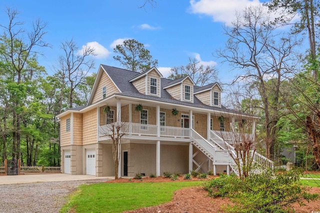 1533 Murrells Landing Rd, Conway, SC 29526 - view of front of house with a porch, stairs, gravel driveway, a garage, and a front lawn