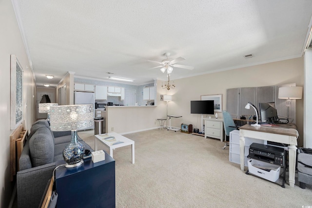 living room featuring ceiling fan, ornamental molding, a textured ceiling, an office area, and light carpet