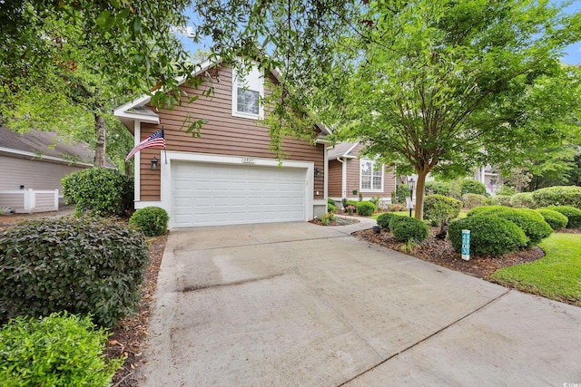 4803 Bucks Bluff Dr, North Myrtle Beach, SC 29582 - view of front of home featuring concrete driveway and an attached garage