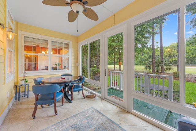 4803 Bucks Bluff Dr, North Myrtle Beach, SC 29582 - sunroom / solarium with a ceiling fan, tile patterned flooring, and outdoor dining space