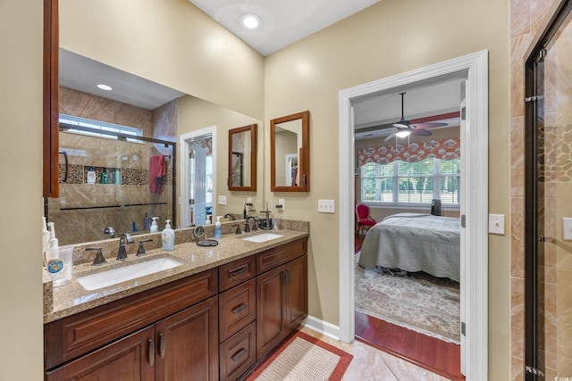 4803 Bucks Bluff Dr, North Myrtle Beach, SC 29582 - full bathroom with ensuite bath, a shower stall, double vanity, ceiling fan, and baseboards