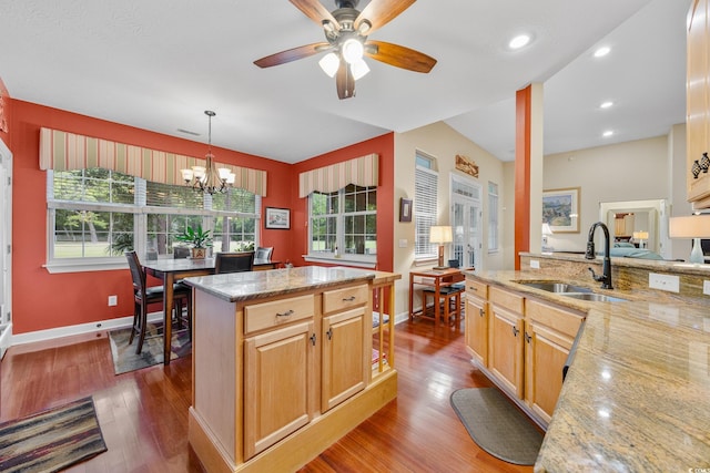 4803 Bucks Bluff Dr, North Myrtle Beach, SC 29582 - kitchen with a sink, baseboards, dark wood finished floors, light stone countertops, and recessed lighting